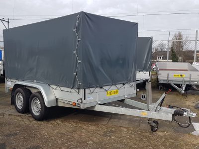 Aanhangwagen dubbel-asser met huif, geremd